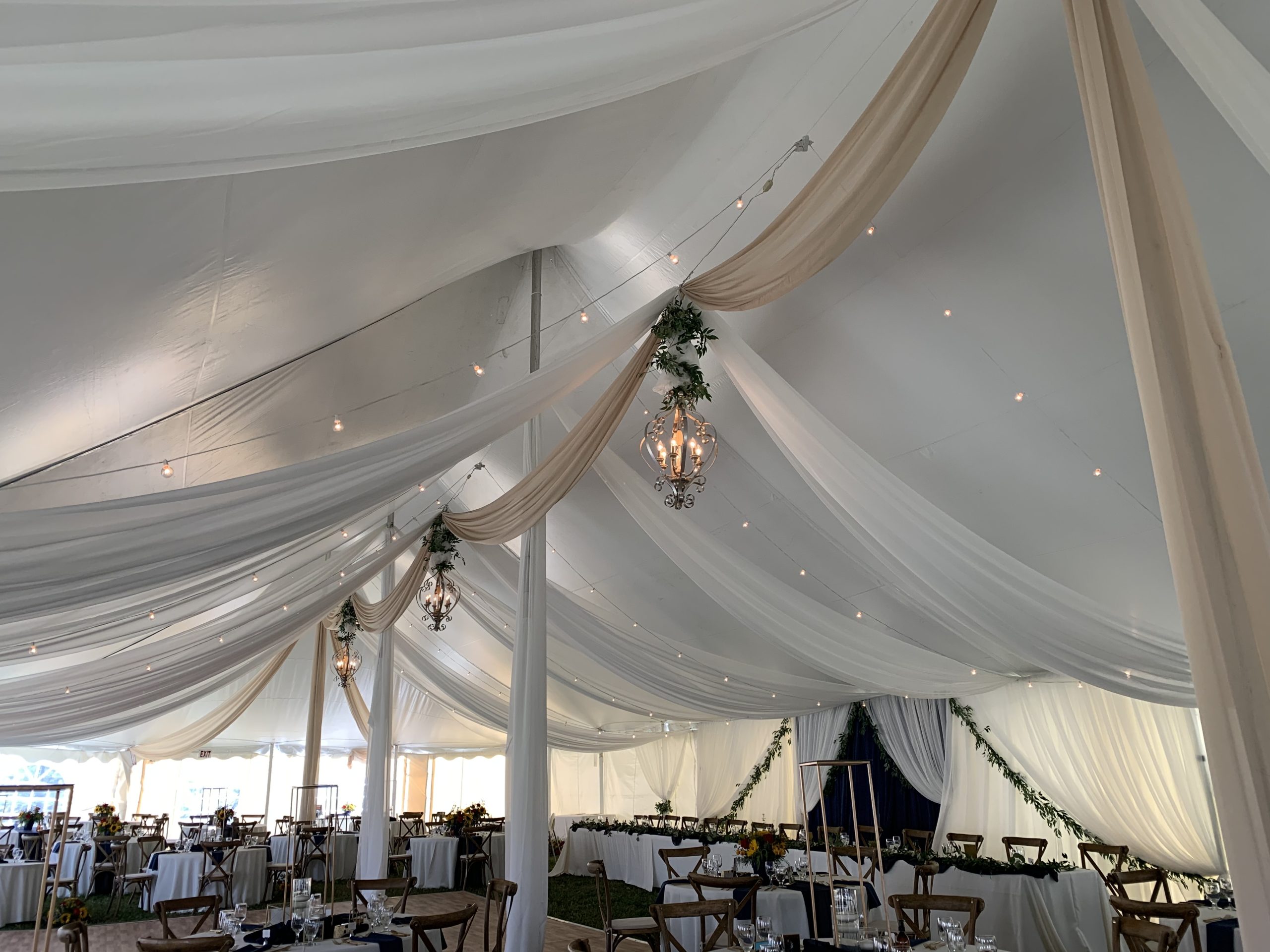 Tent with wedding decorations by devine wedding design in ontario.
